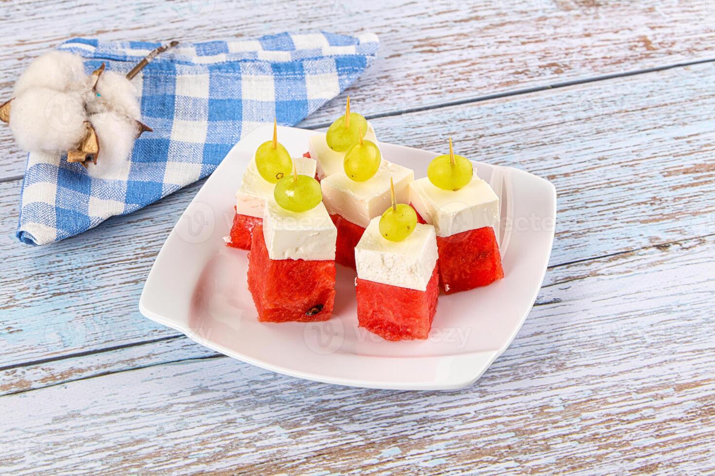 Watermelon with feta and grape photo