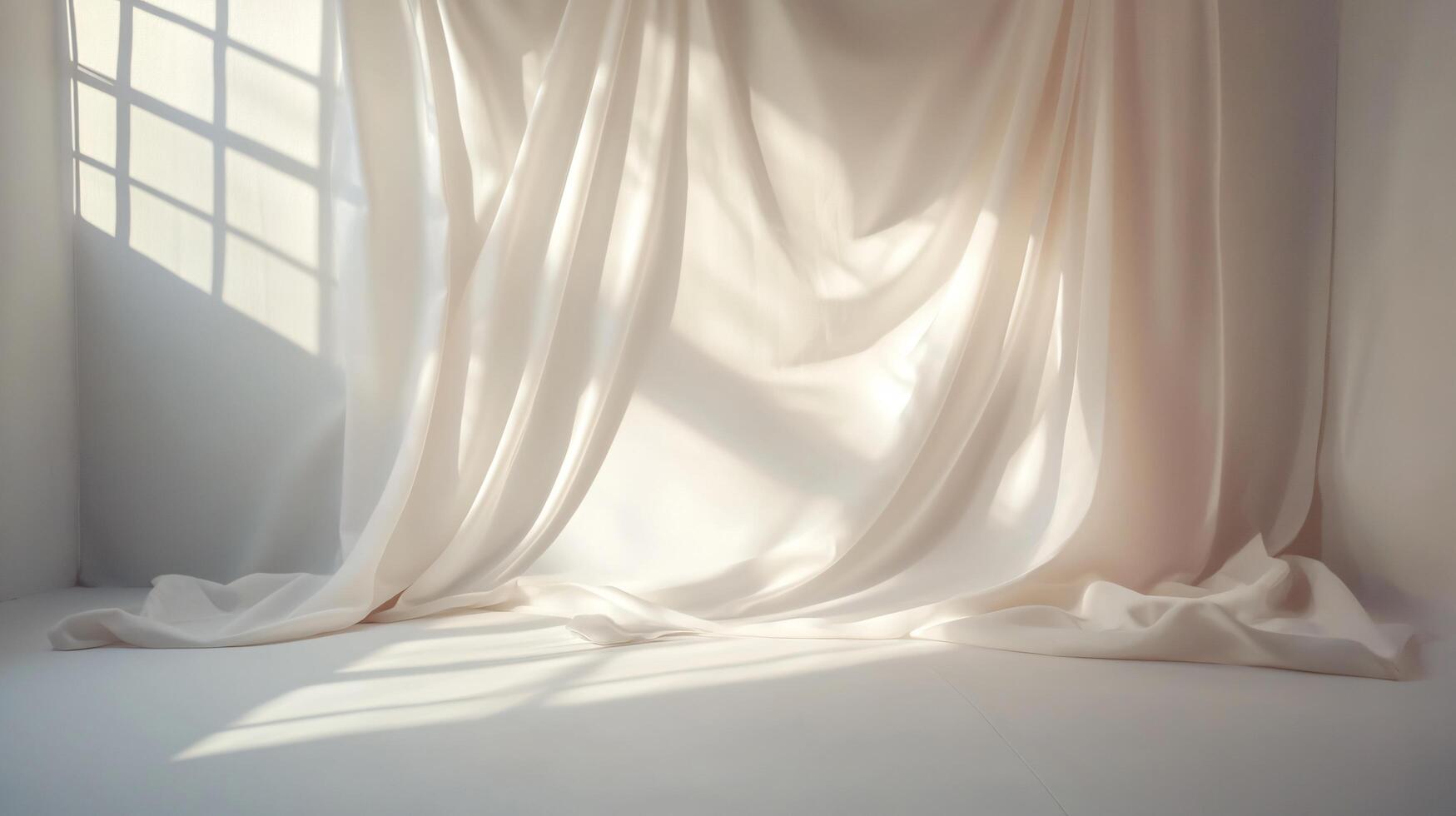A white room with a curtain hanging from the ceiling photo
