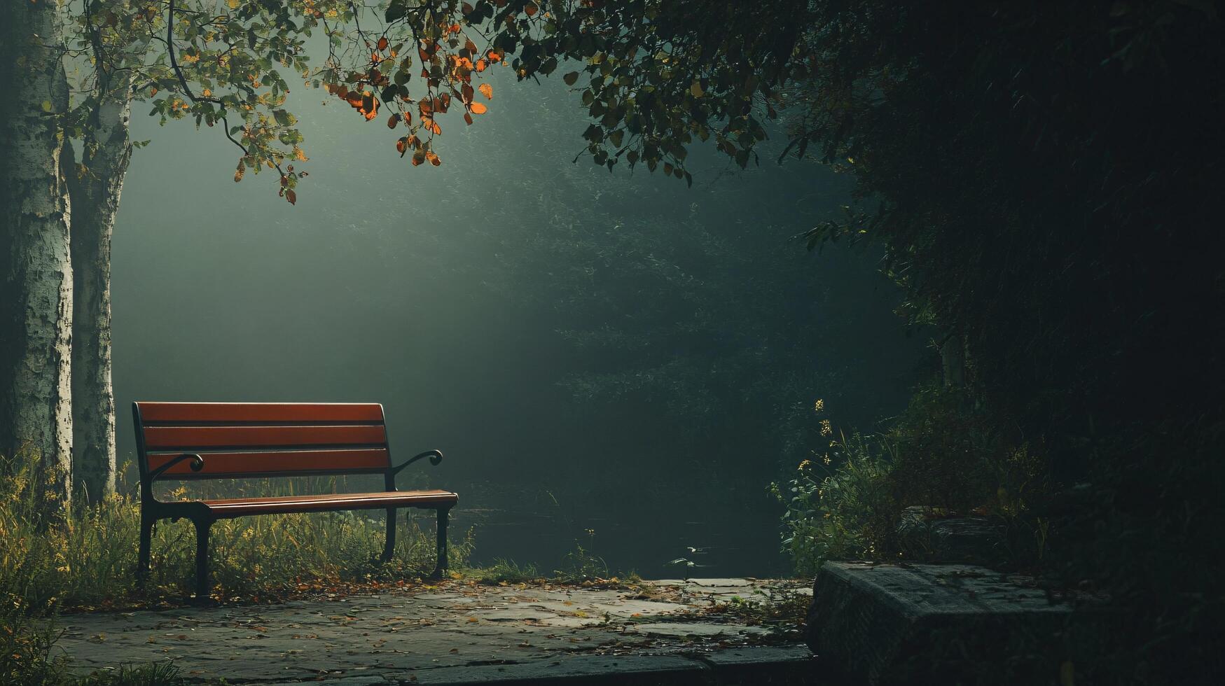 A bench is sitting in a park with trees in the background photo