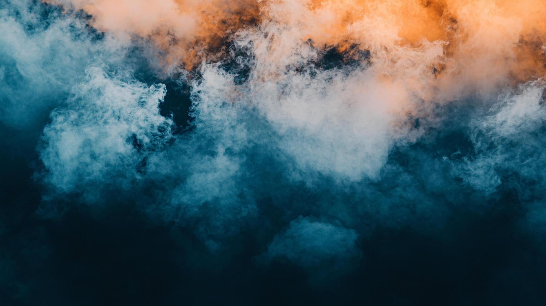 A blue and orange cloud with white clouds in the background photo