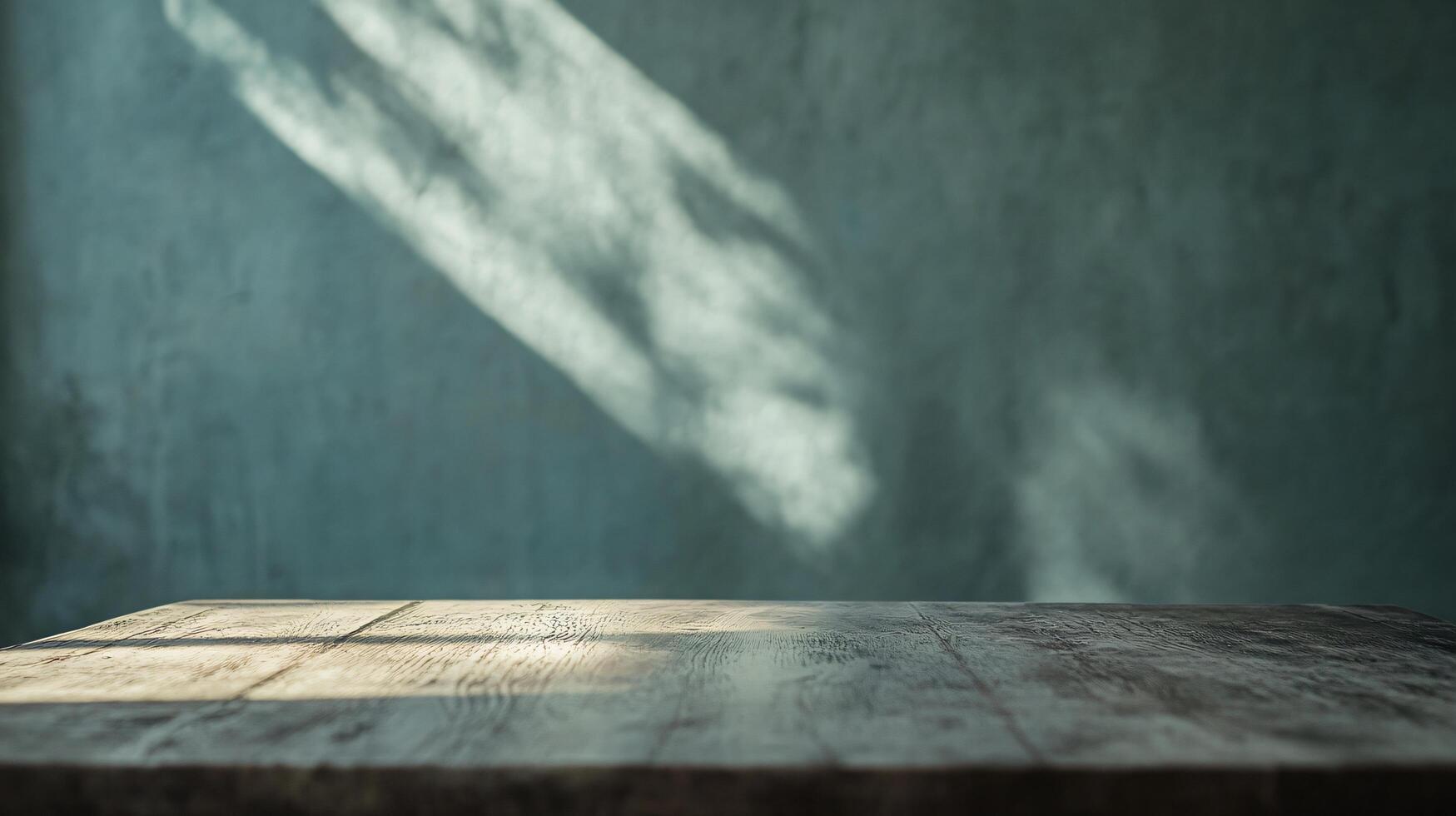 A wooden table with a shadow on it photo