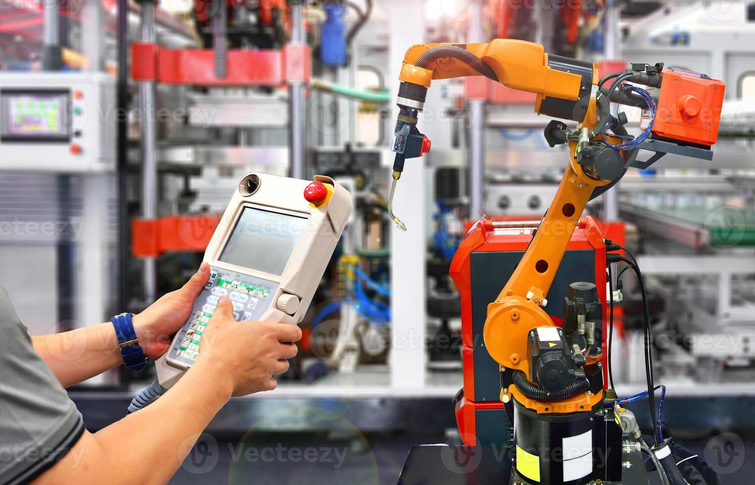 Engineer check and control automation Modern Robot system in factory, Industry Robot concept . photo