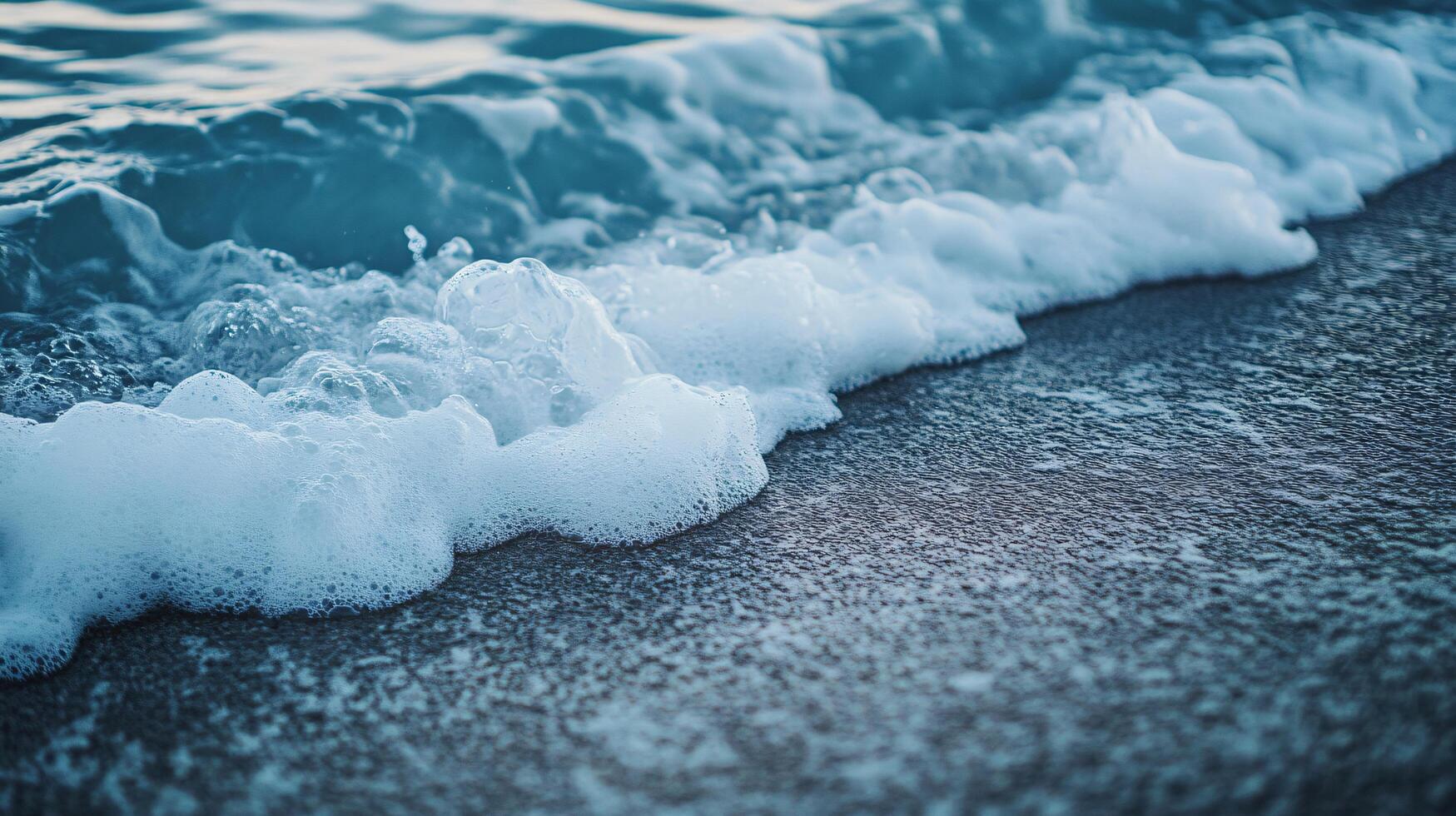 The ocean is calm and the waves are small photo