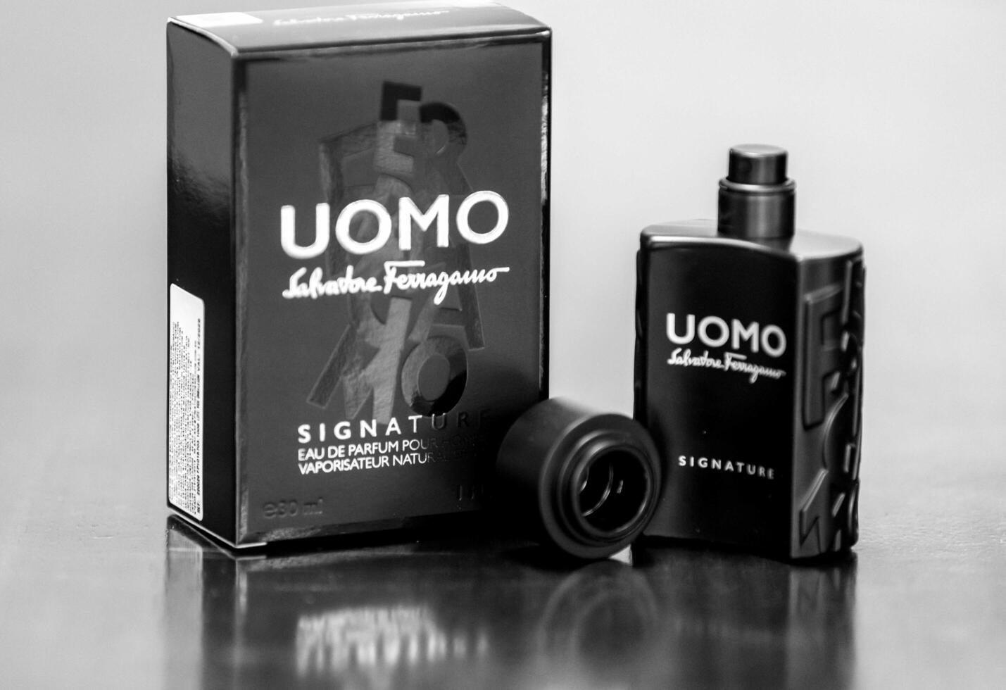Brazil, December 21, 2024. Vintage Uomo Signature men's perfume with a warm and spicy olfactory pyramid for autumn winter. photo