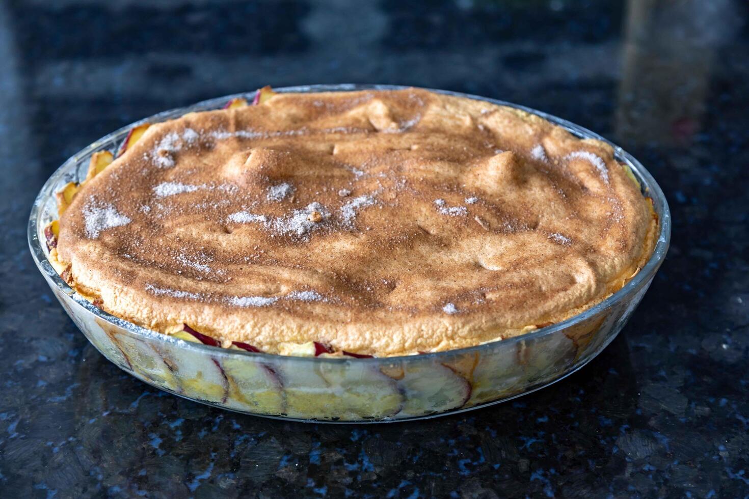 Typical Brazilian apple pie with cloves and cinnamon in fine detail and selective focus photo