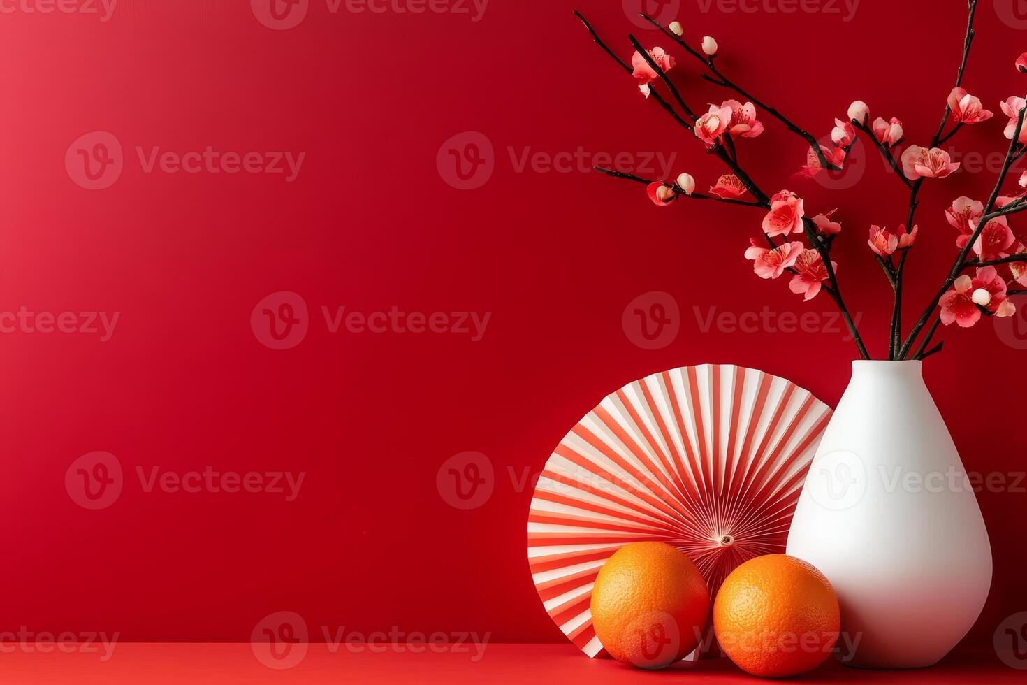 Celebrating Chinese New Year with tangerines and peach blossoms in a minimalist setting photo