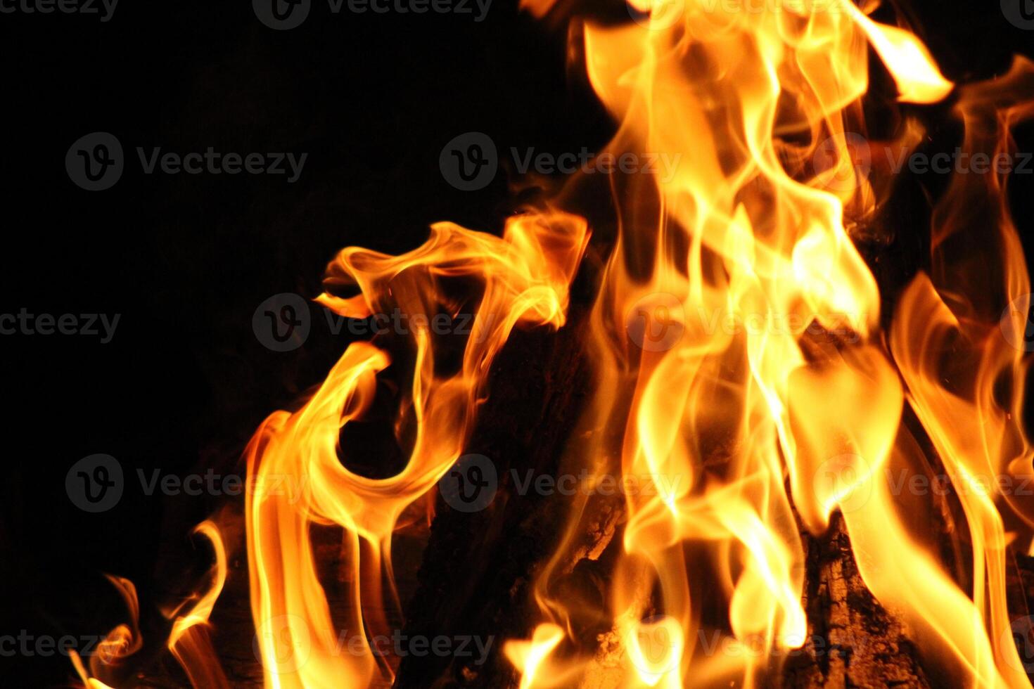 Fire Flames With A Black Background. photo