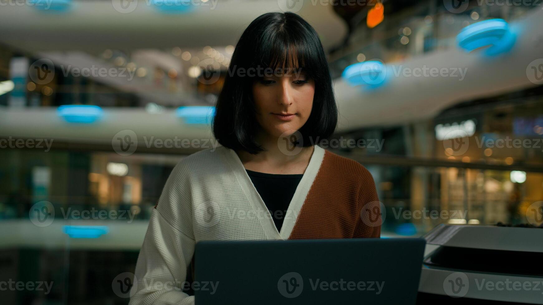 Woman working distant with laptop freelancer girl student typing computer using online web for work studying chatting in social media businesswoman browsing Internet indoors remote shopping ecommerce photo