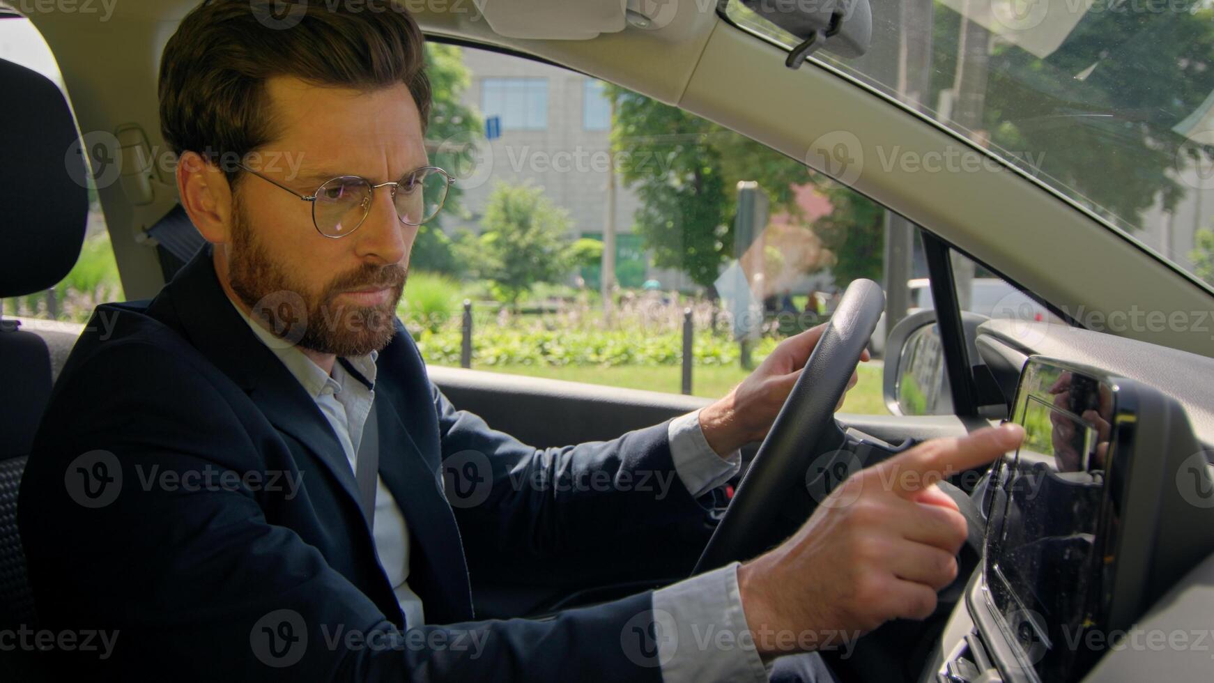 Caucasian man male businessman guy upset driver car owner inside automobile stressed confused auto navigation electric transport navigator road destination error mistake device gps app drive traffic photo