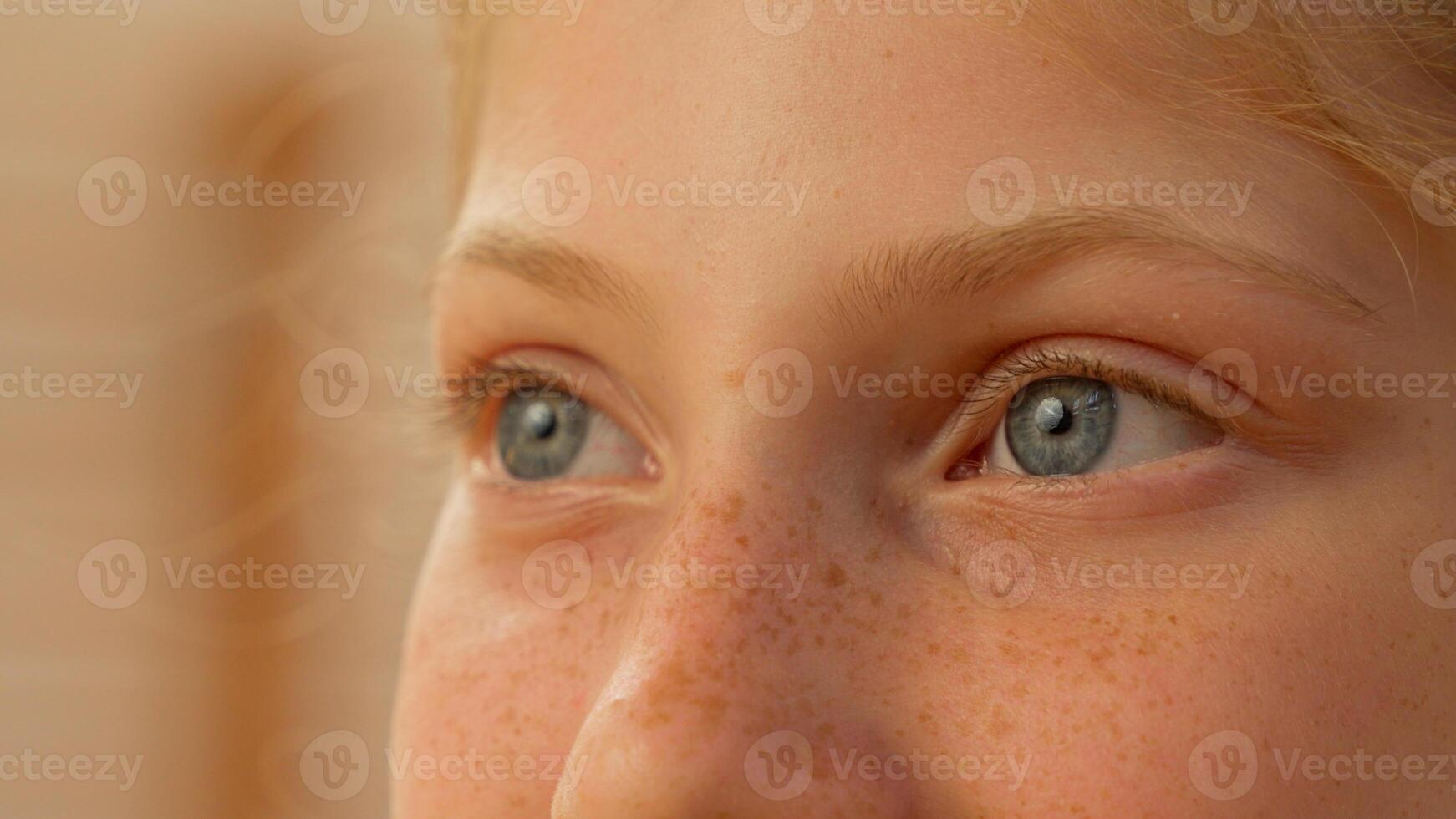 Close up girl little child face Caucasian kid with blue eyes looking at camera innocent teen happy adopted daughter ginger schoolgirl female school student smiling healthcare sport event soap bubbles photo
