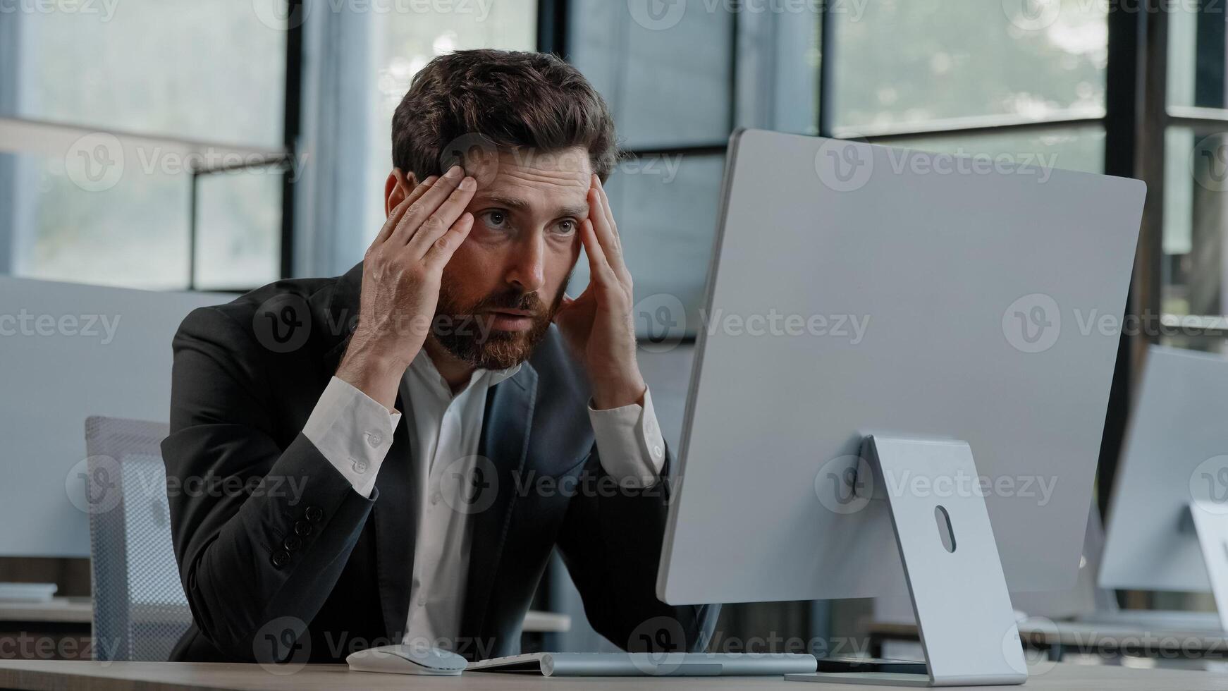 Caucasian bearded 40s middle-aged businessman worker employee man typing laptop feel failure upset with lost of information online error stressed look at computer screen suffer from headache pressure photo