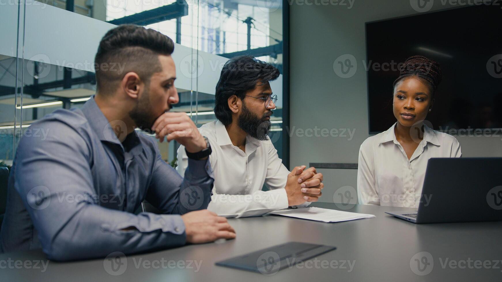African American female businesswoman company CEO corporate mentor coach with laptop computer discuss startup corporate project with multiethnic business team diverse men brainstorm in office meeting photo