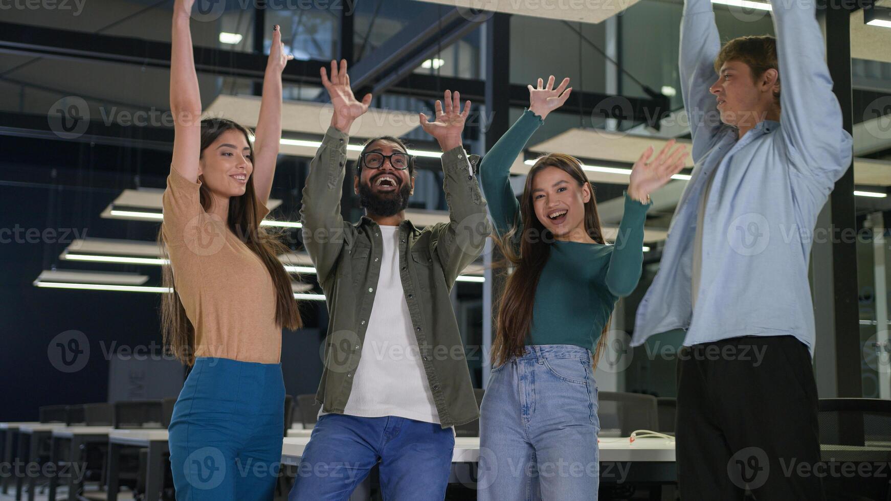 Happy business women men multiracial friends students group corporate colleagues stacking hands in pile join team gesture unity teamwork support girls guys male female put arms together union victory photo