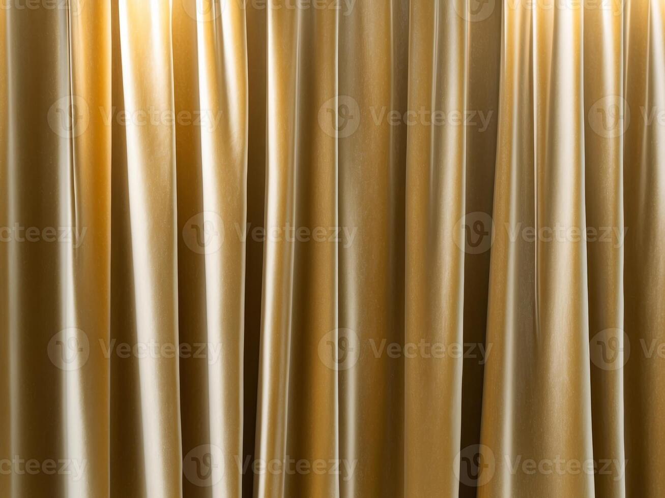 Rich golden fabric drapes gracefully in soft light creating an elegant texture and depth that highlights its luxurious appeal photo