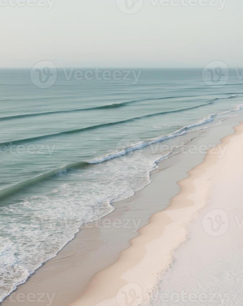 A beach with waves and sand photo