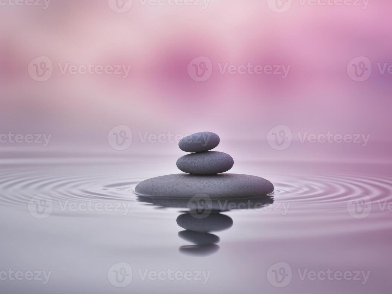 pebbles balanced tranquil water surface amidst serene hues pink purple photo