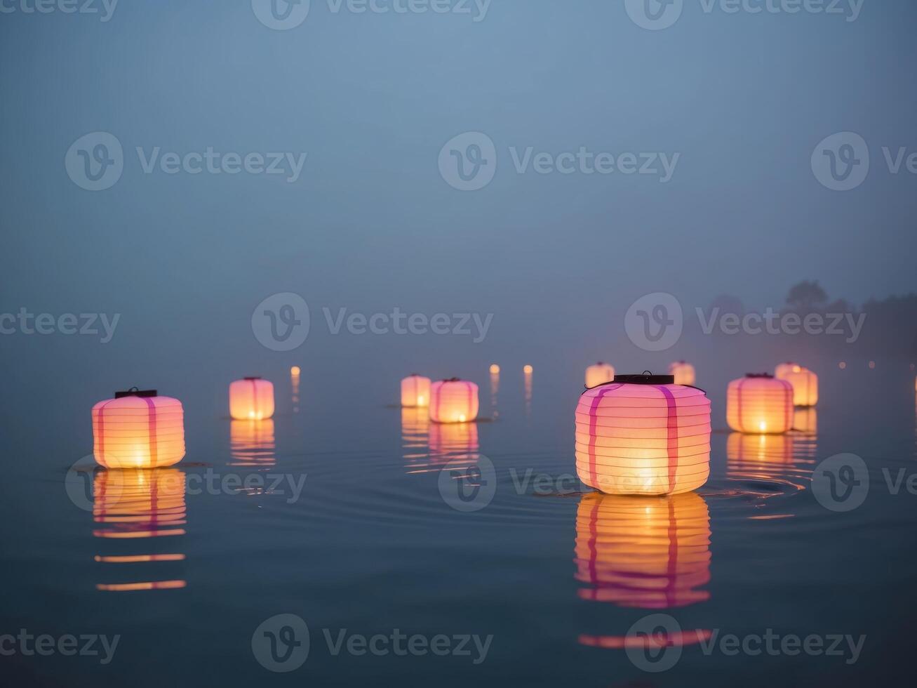 Softly Illuminated Floating Lanterns on Water photo