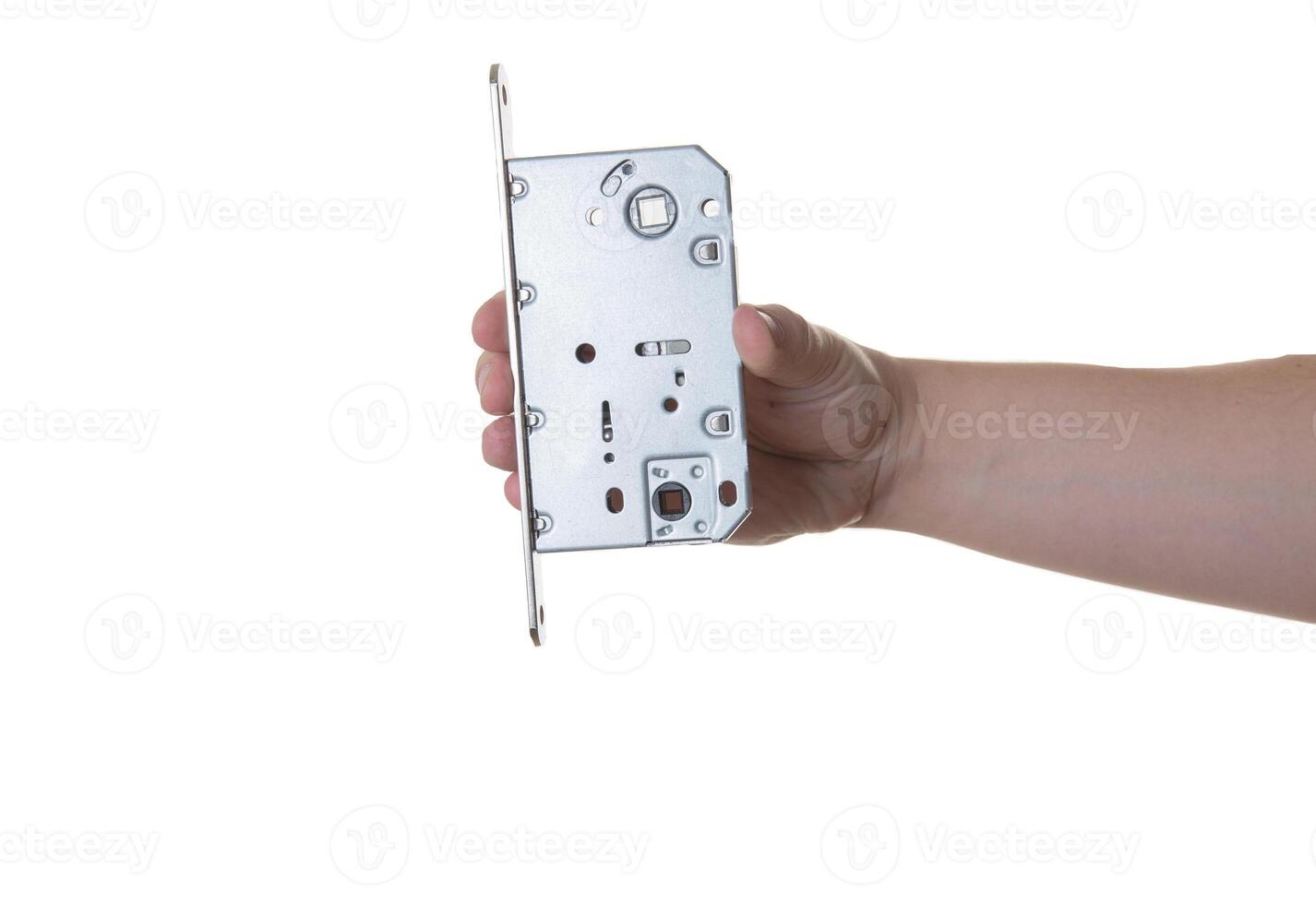 Magnetic latch for doors in hand on a white background, isolate. Close-up photo