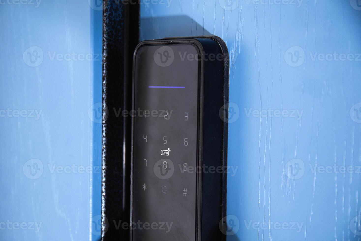 Modern electronic reliable door lock using an access password and a card. High burglary protection. photo