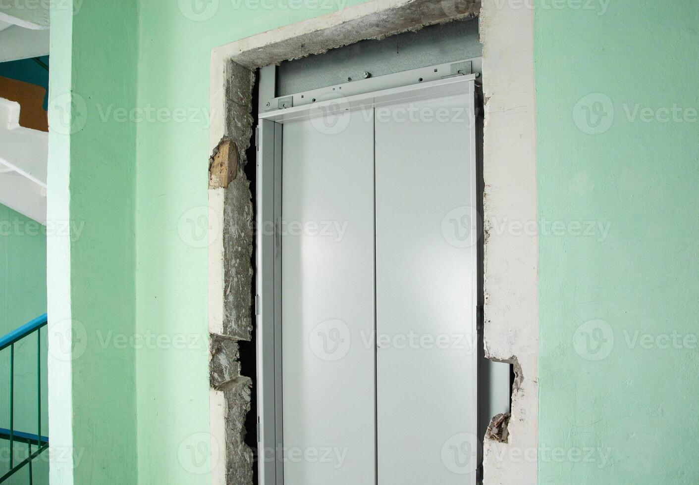 Replacing an old elevator and installing a new one in an apartment building, industry photo
