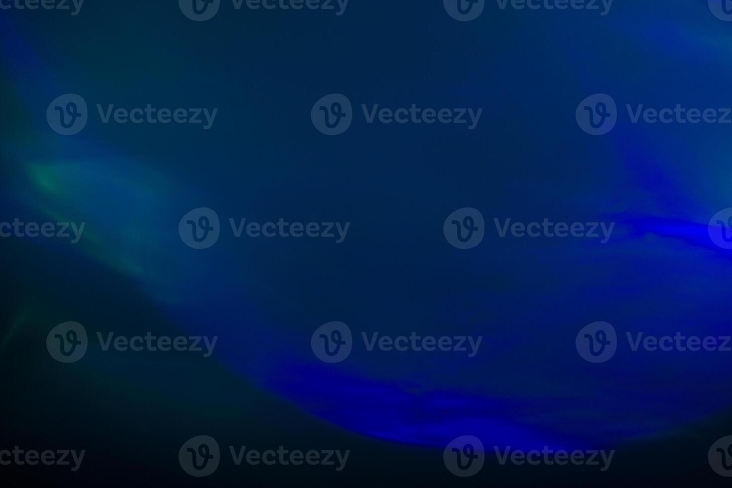 Blurred lens flare. Defocused colorful lights. Shiny glowing spots, abstract background and texture photo