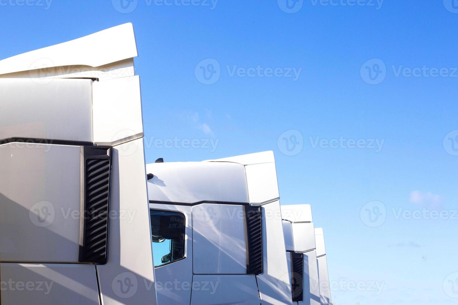 Spoilers and fairings for cabins on truck tractors against the blue sky. Aerodynamic effect concept, copy space for text photo