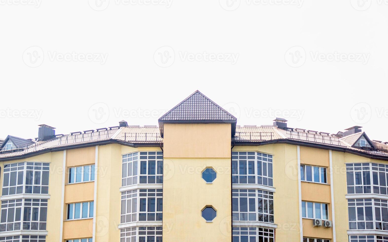 Beautiful modern multi-storey building with windows. Stylish residential building, copy space photo
