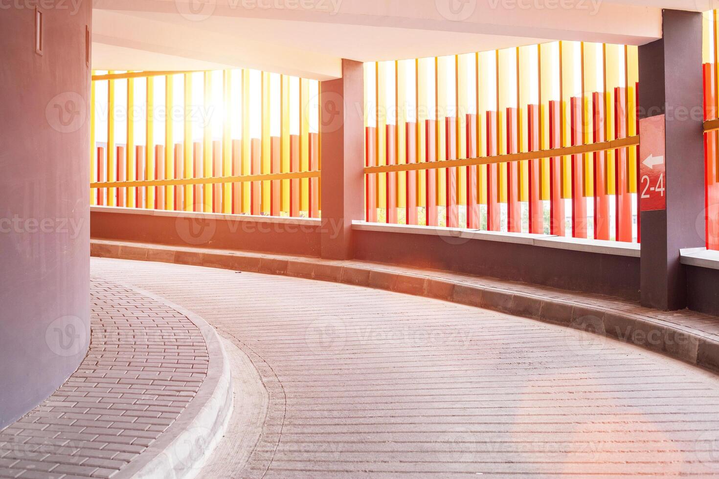 Check-in at the screw parking for cars in the city. Modern parking, sunset, background photo