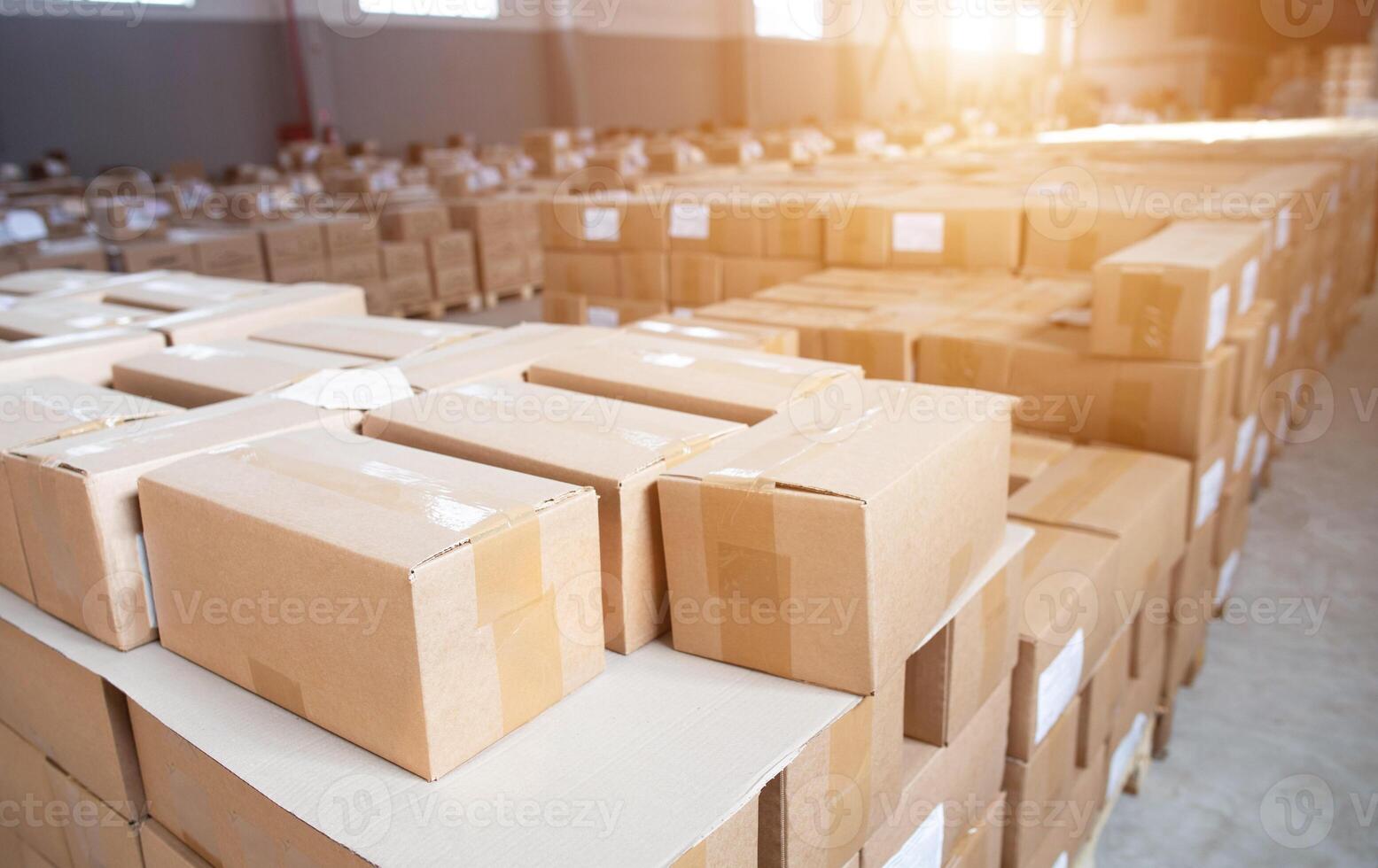 A lot of cardboard boxes in stock. Detention of smuggled goods at customs. The concept of illegal crossing of cigarette and alcohol products, sunset photo