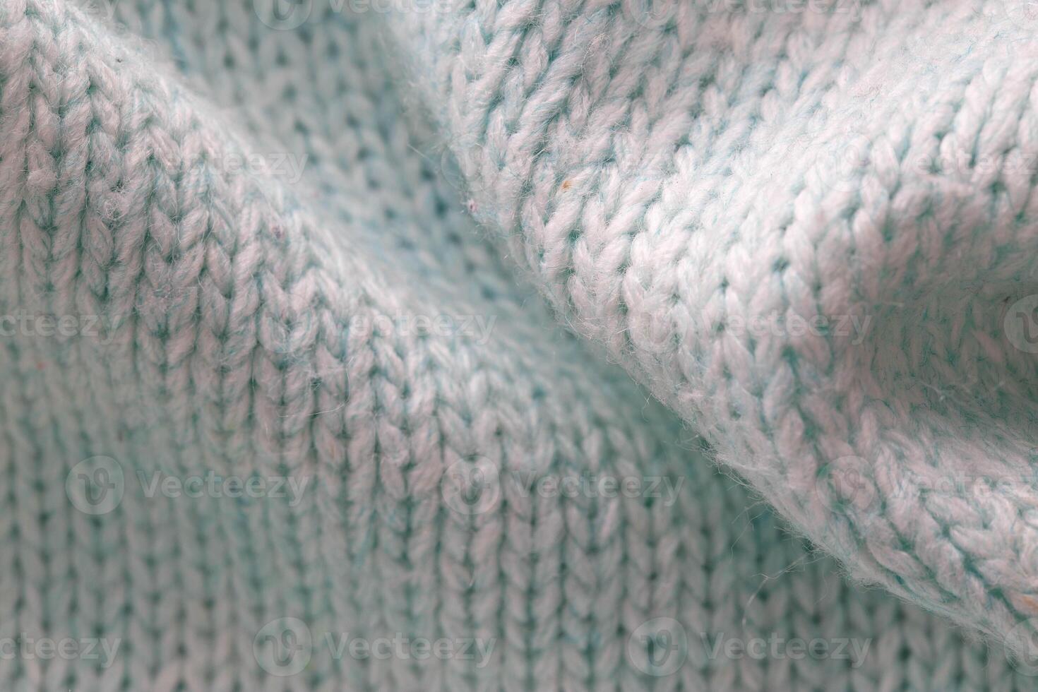 Warm gray sweater material, background, macro. Comfort photo