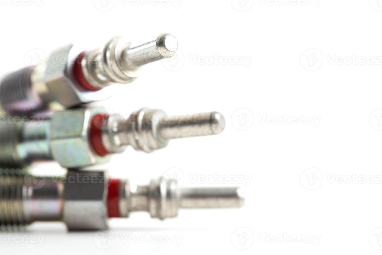 Modern ceramic glow plugs for warming up a diesel engine before starting. White background, isolate. Macro photo