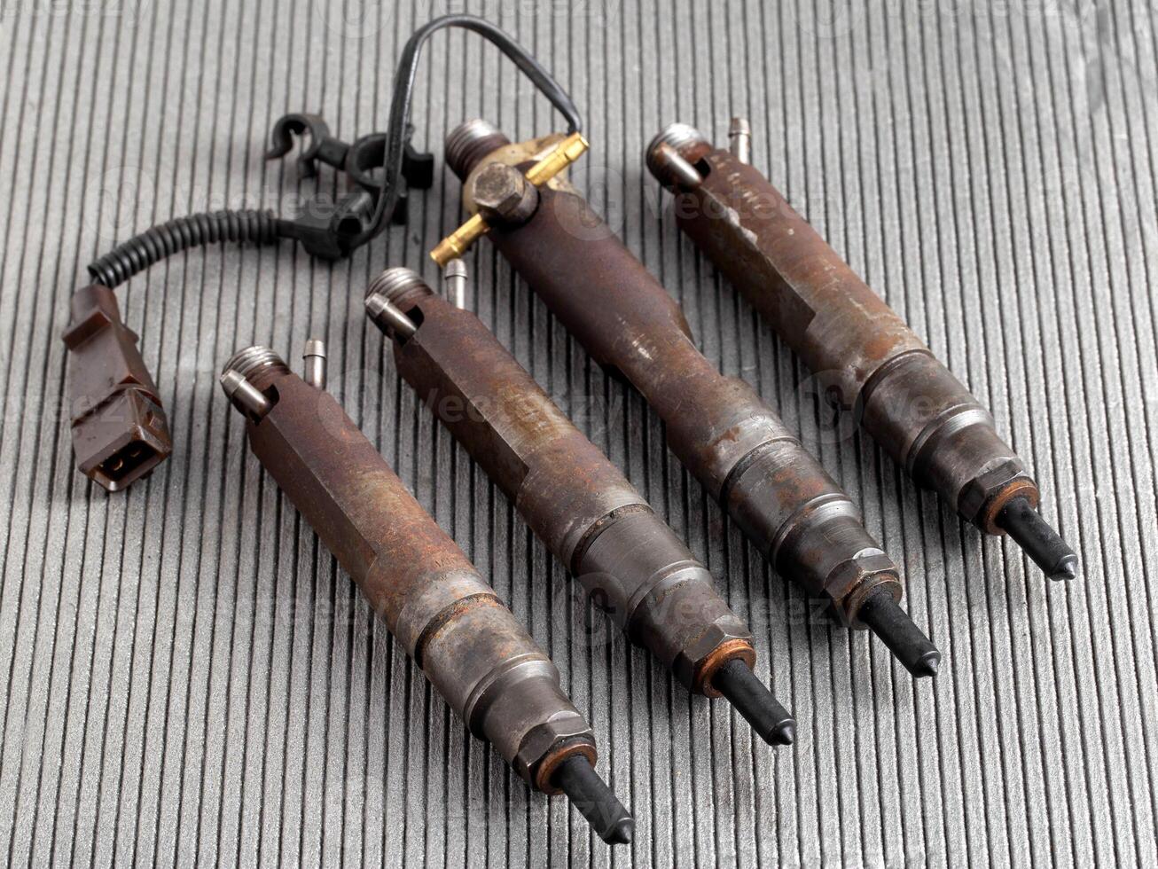 Injectors with diesel engine fuel supply system. Fuel spray. Automotive Part. Copy space for text photo