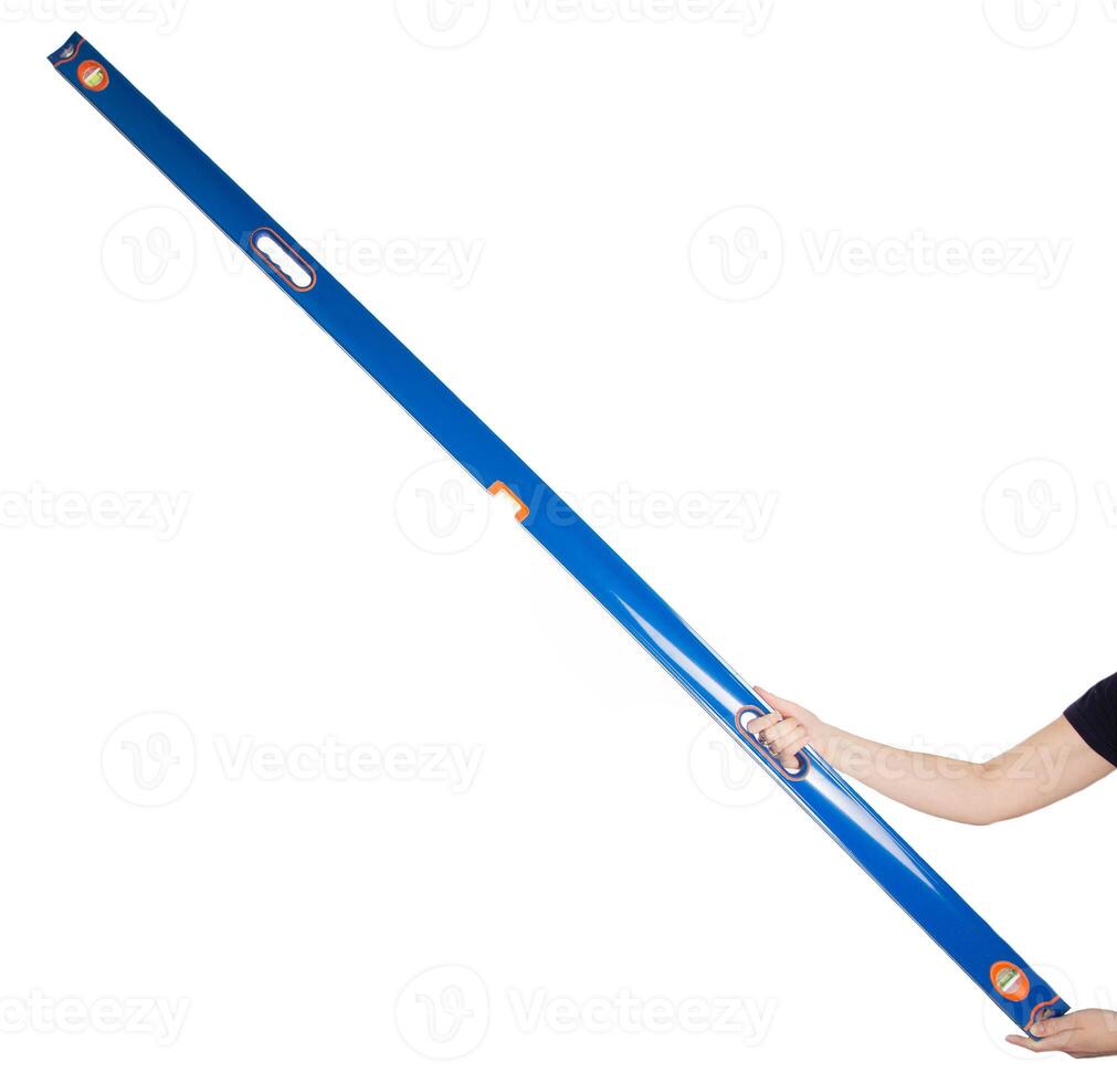 Construction aluminum level in hand on a white background. Flat Surface Measurement Tool. Isolate photo