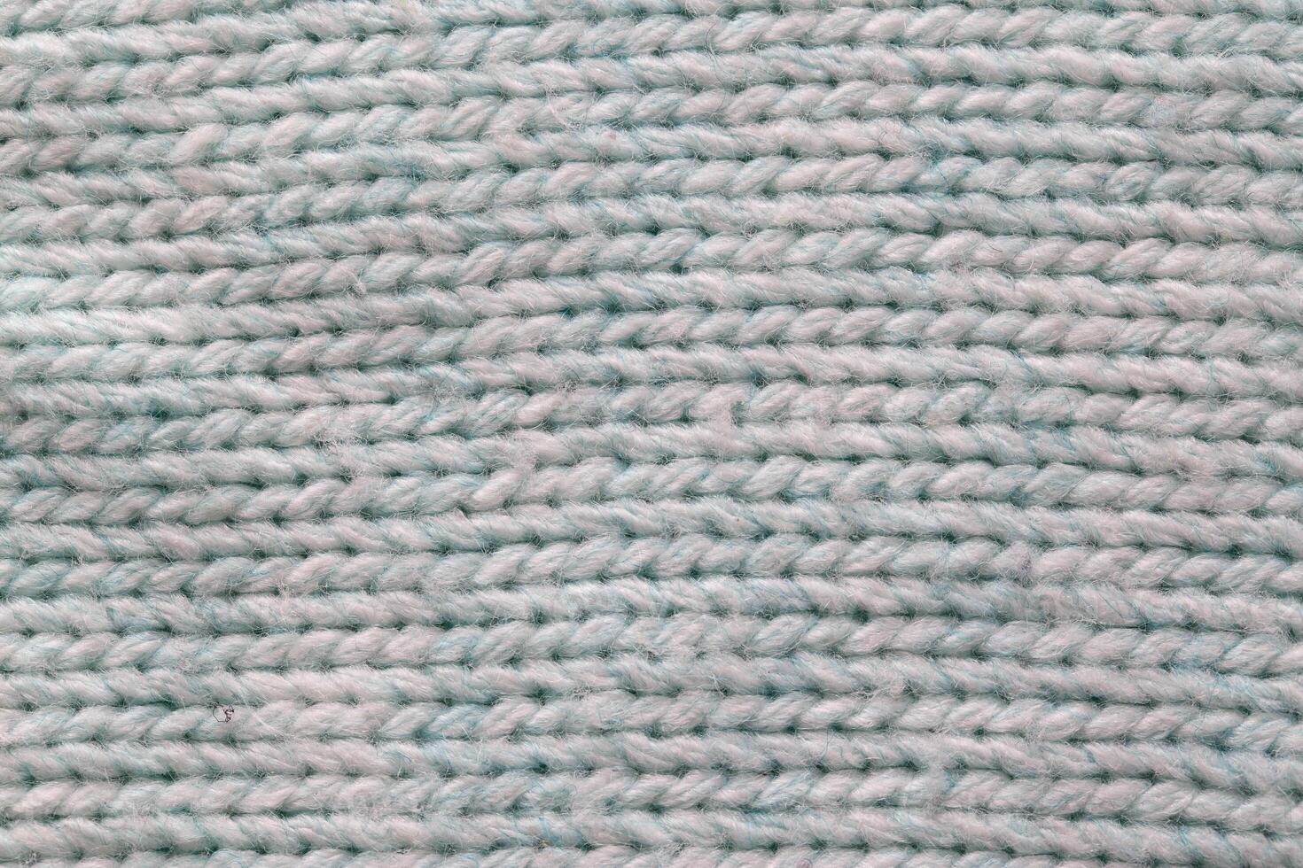 Warm gray sweater material, background, macro. Comfort photo