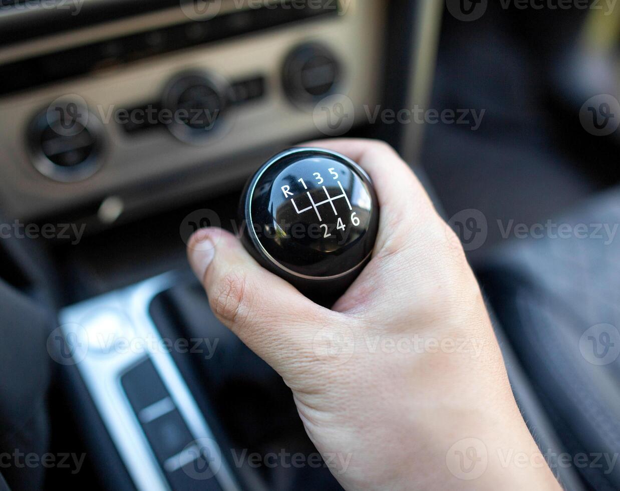 Switching a mechanical 6-speed gearbox in a car, close-up. Transmission photo