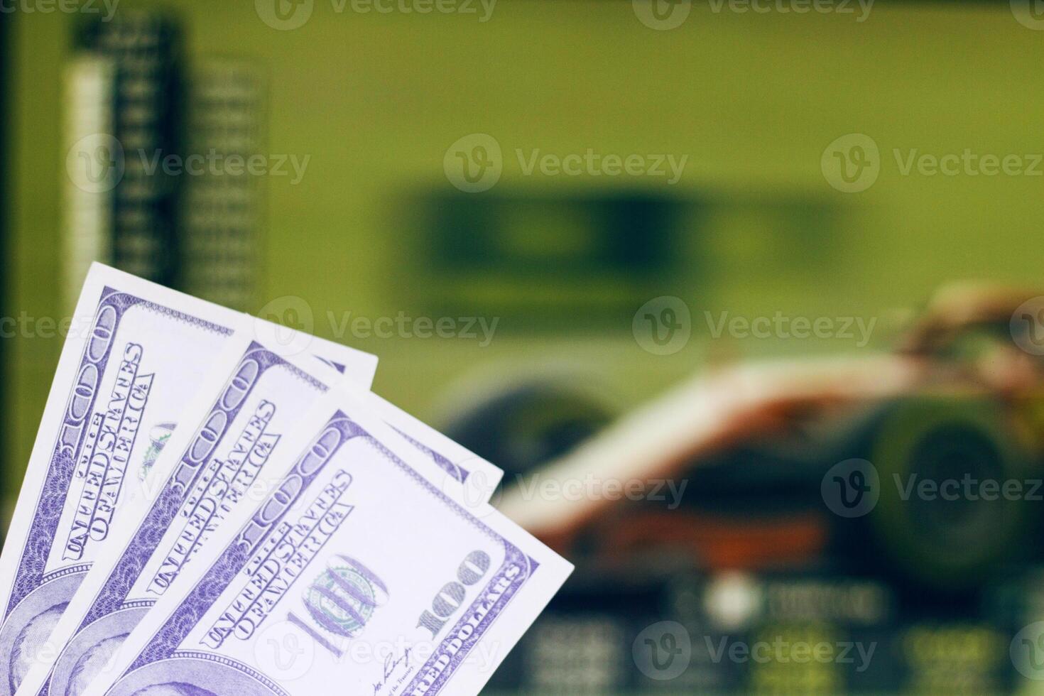 money dollars on the background of the TV on which go the auto racing formula, close up, car race photo