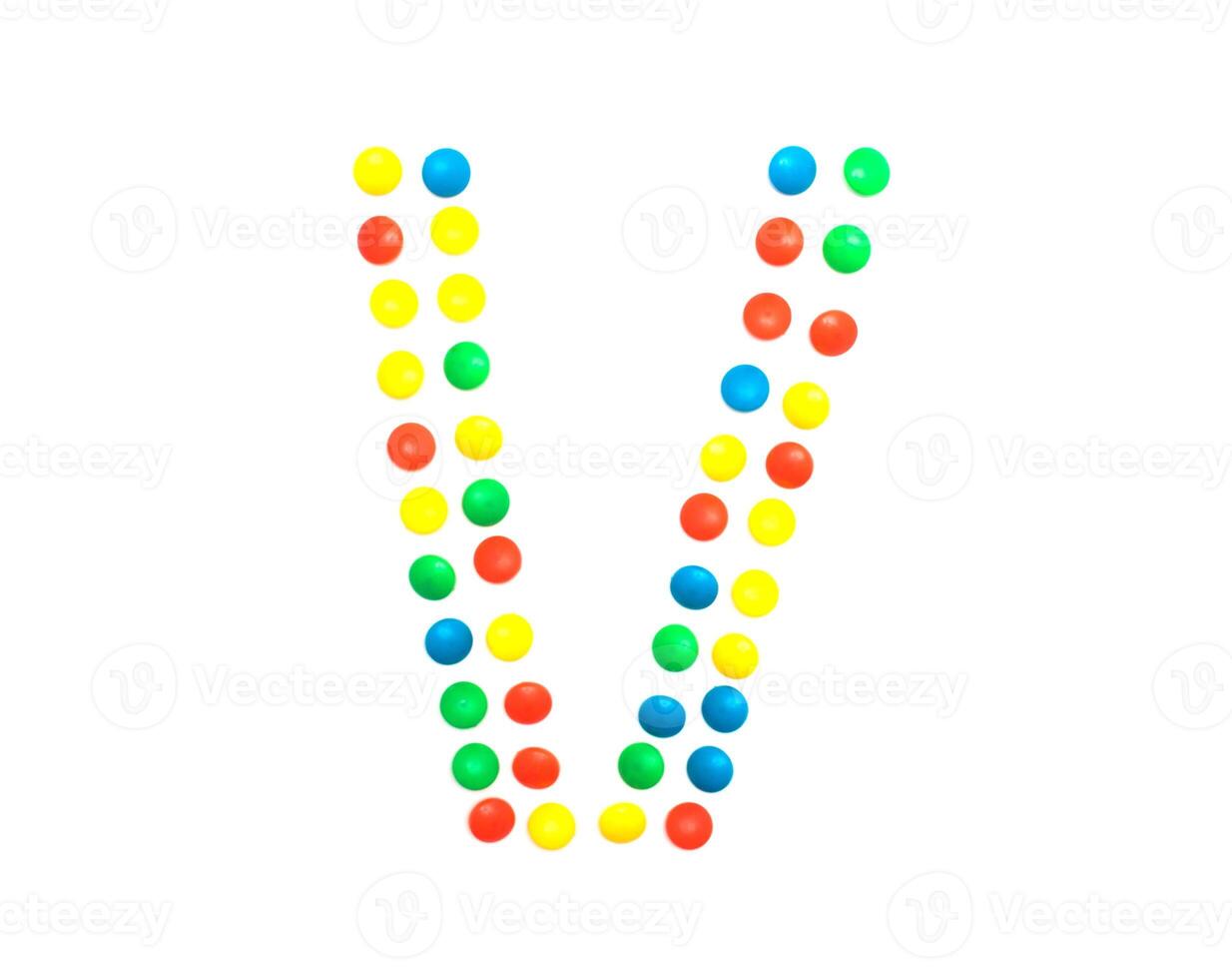 Multicolored alphabet from children's mosaic letter V photo