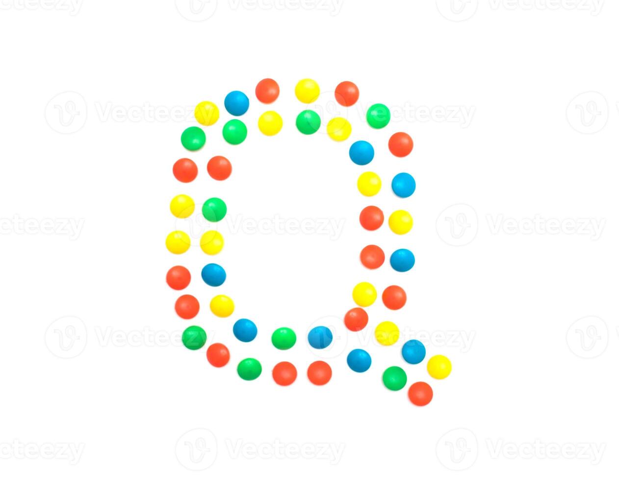 Multicolored alphabet from children's mosaic letter Q photo