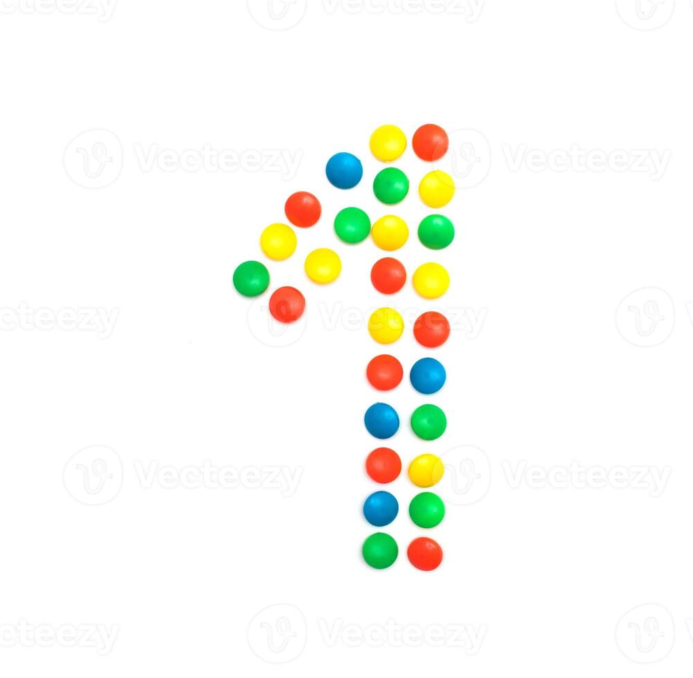 Children's numbers laid out from a multi-colored mosaic figure number 1, alphabet photo
