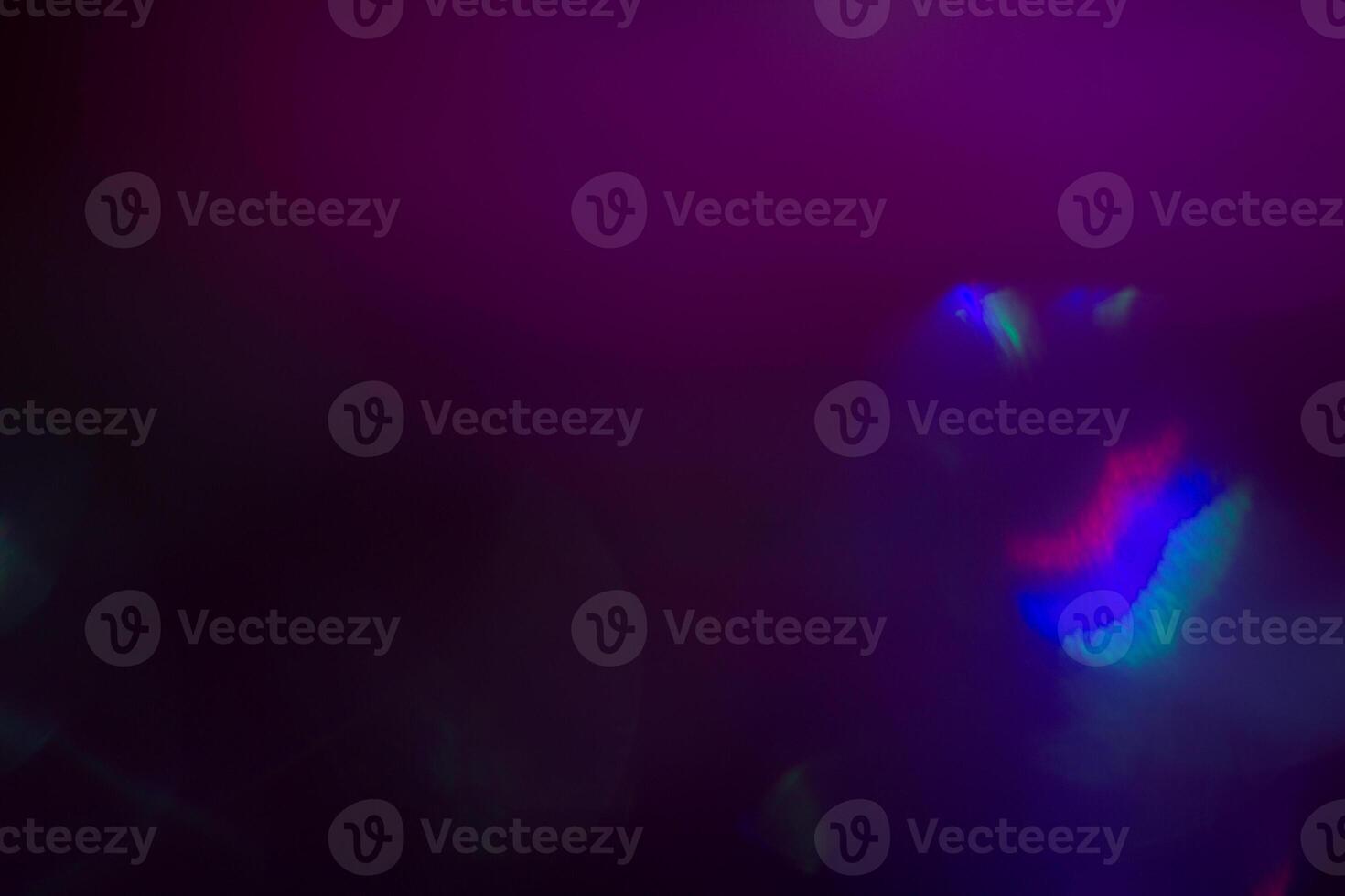 illuminated burst of multicolor light. lens flare shine effects. creative background, abstract photo