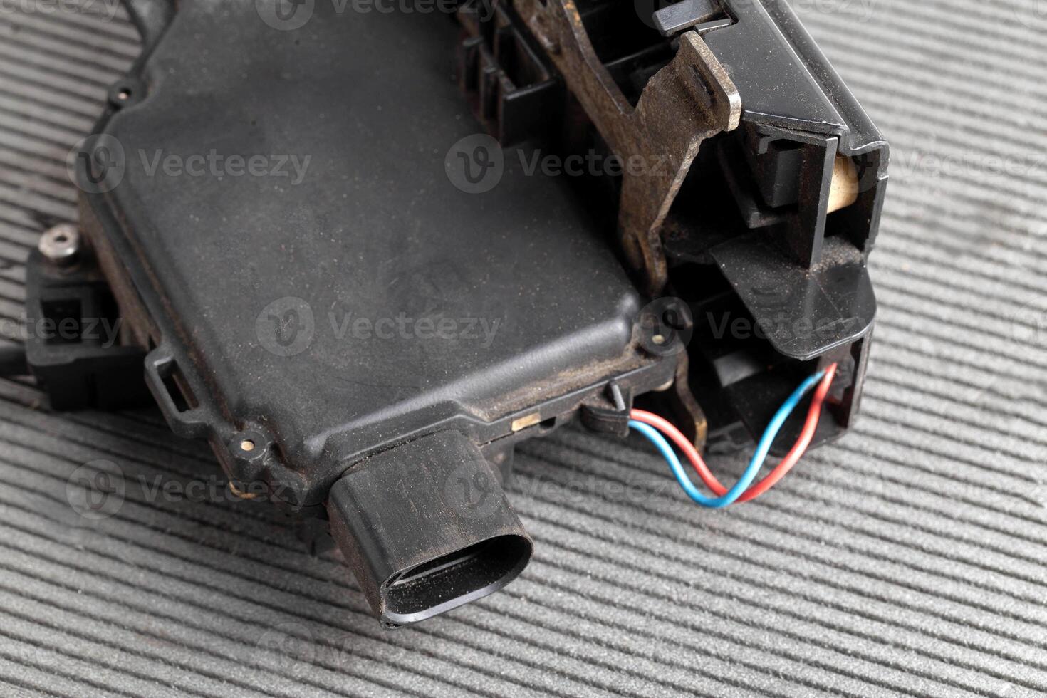 Car electric door lock, close-up. Limit switch failure, automotive part. Car electrical repair, close-up photo