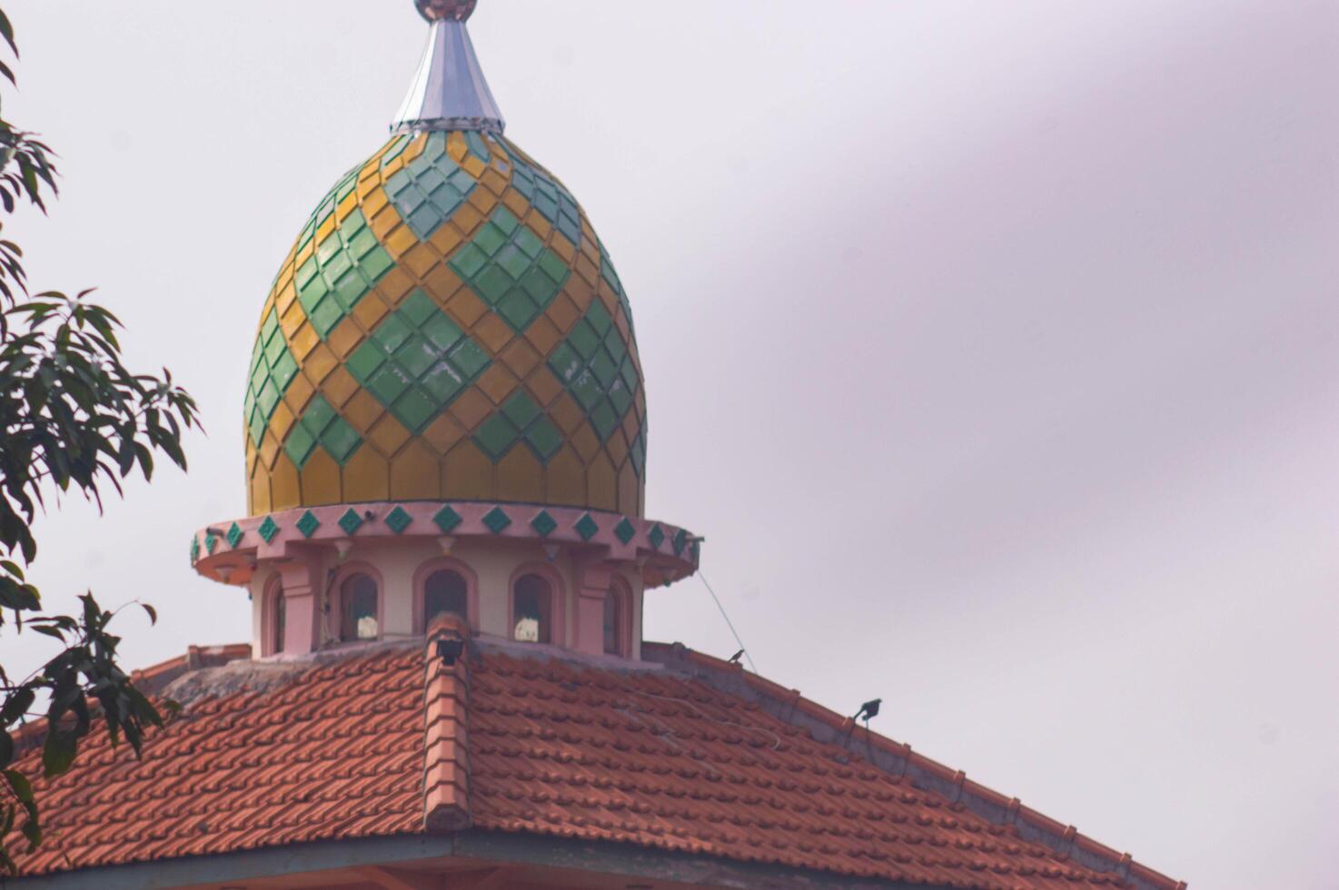 view of the mosque dome with a white sky background photo