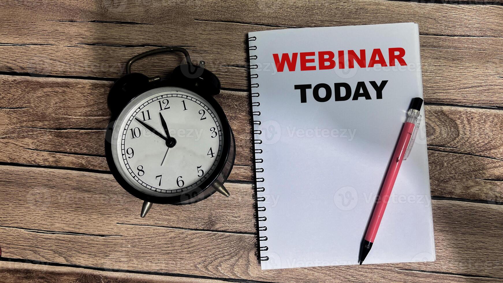 Concept of Webinar Today write on book isolated on Wooden Table. photo