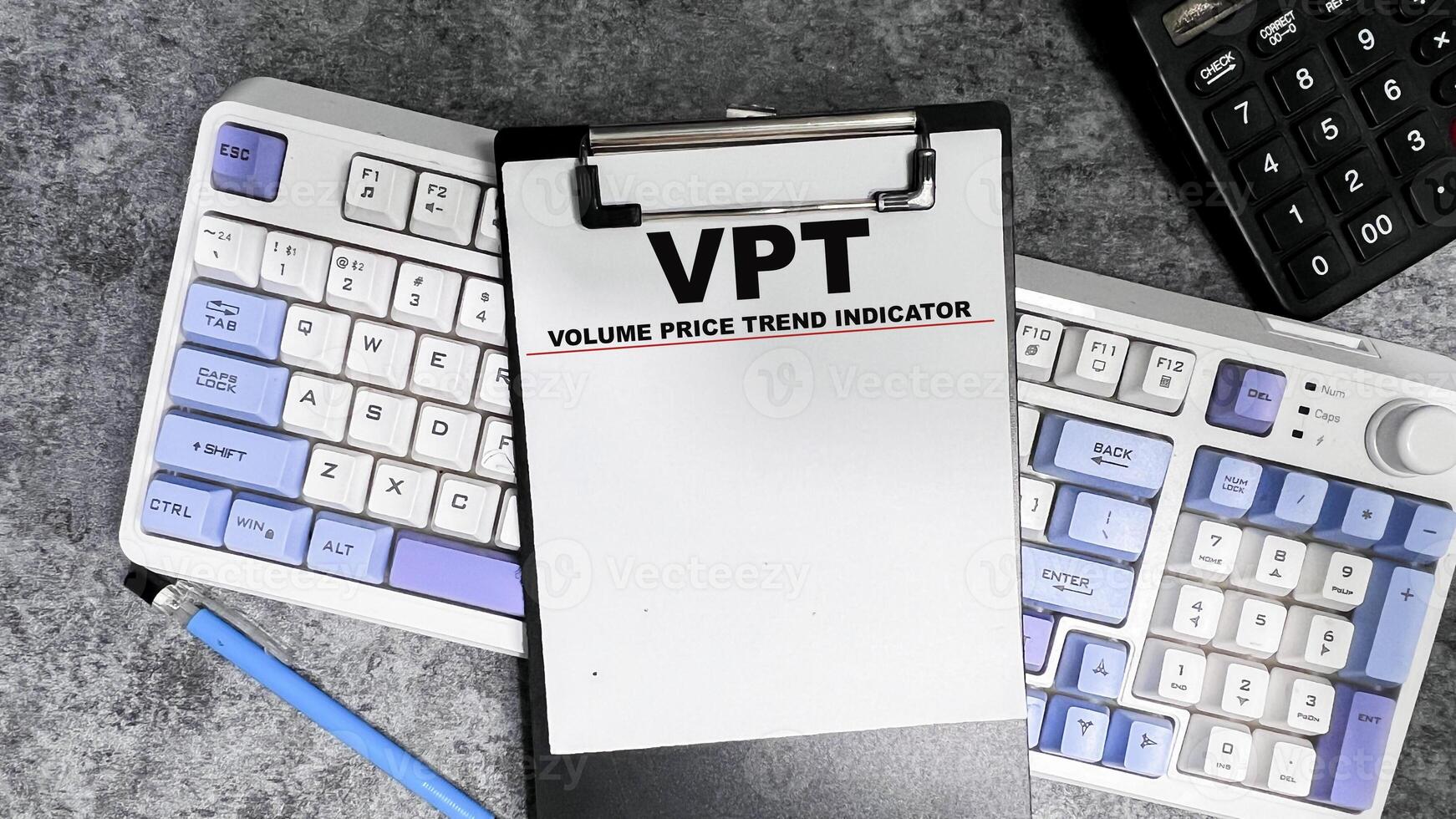 Concept of VPT - Volume Price Trend Indicator write on paperwork isolated on Wooden Table. photo
