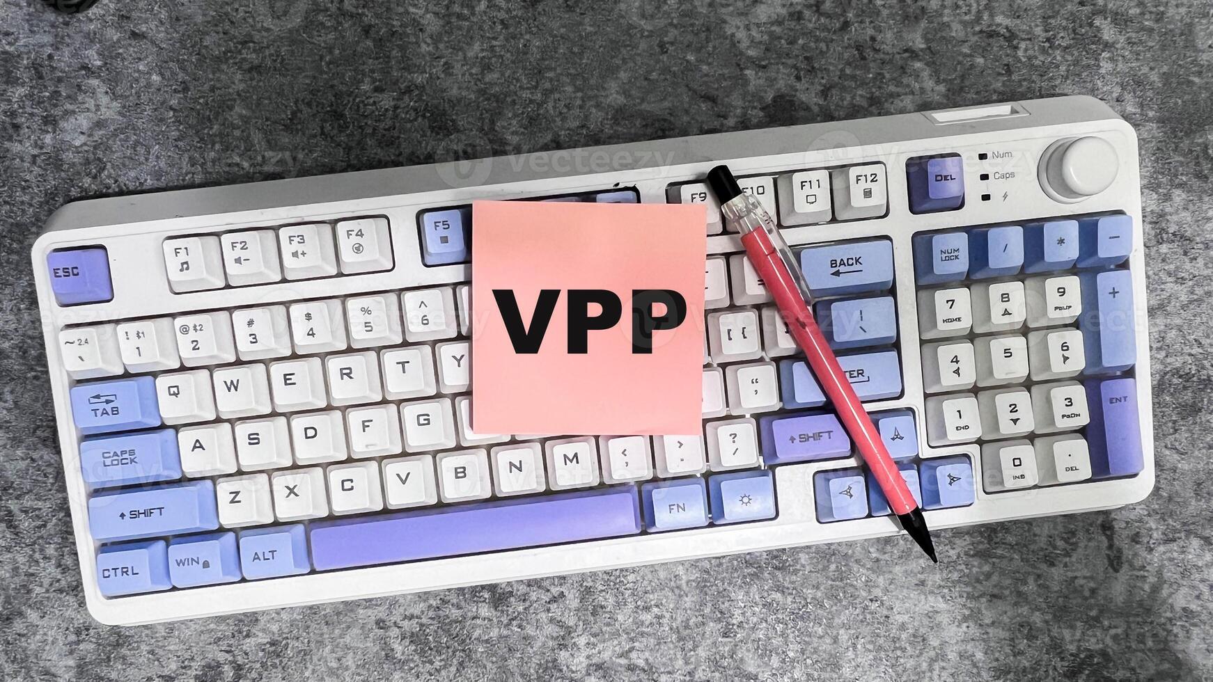 Concept of VPP write on sticky notes isolated on Wooden Table. photo