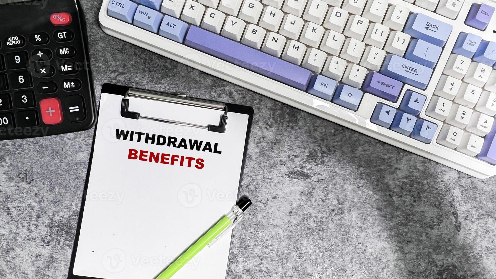 Concept of Withdrawal Benefits write on paperwork isolated on Wooden Table. photo