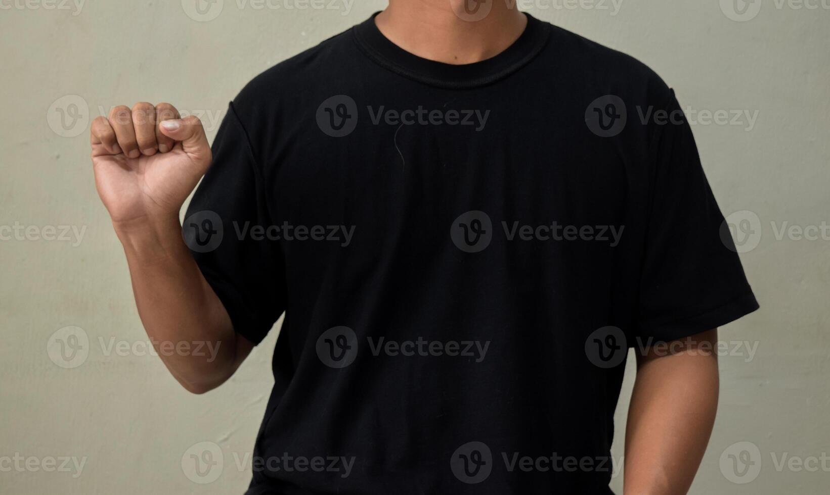 Young man saying I am Fine in sign language, Yes word communication photo