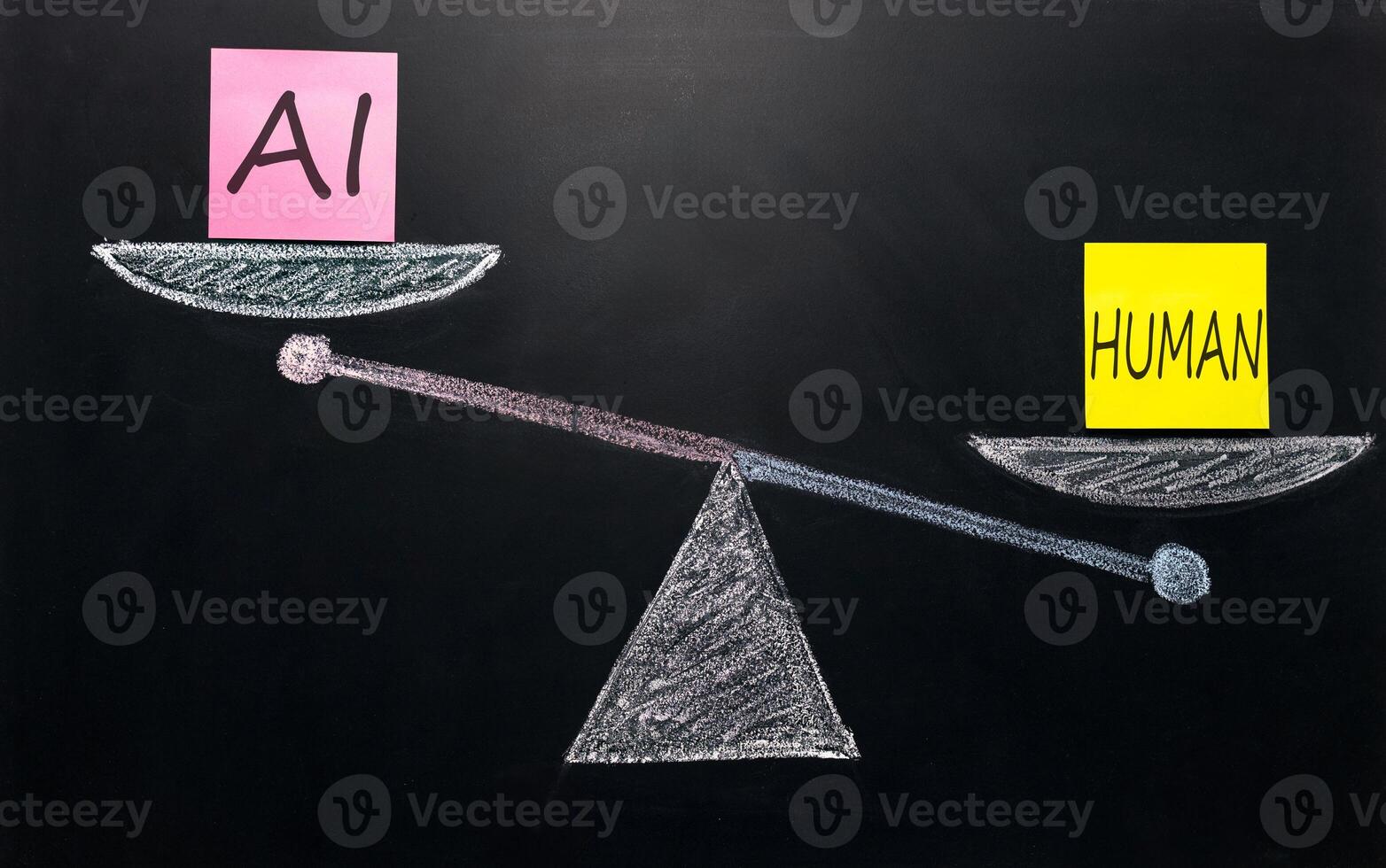 abstraction of balance between artificial intelligence AI and people. on the scales are the inscriptions HUMAN and AI . HUMAN outweighs human, HUMAN is more important than human AI photo
