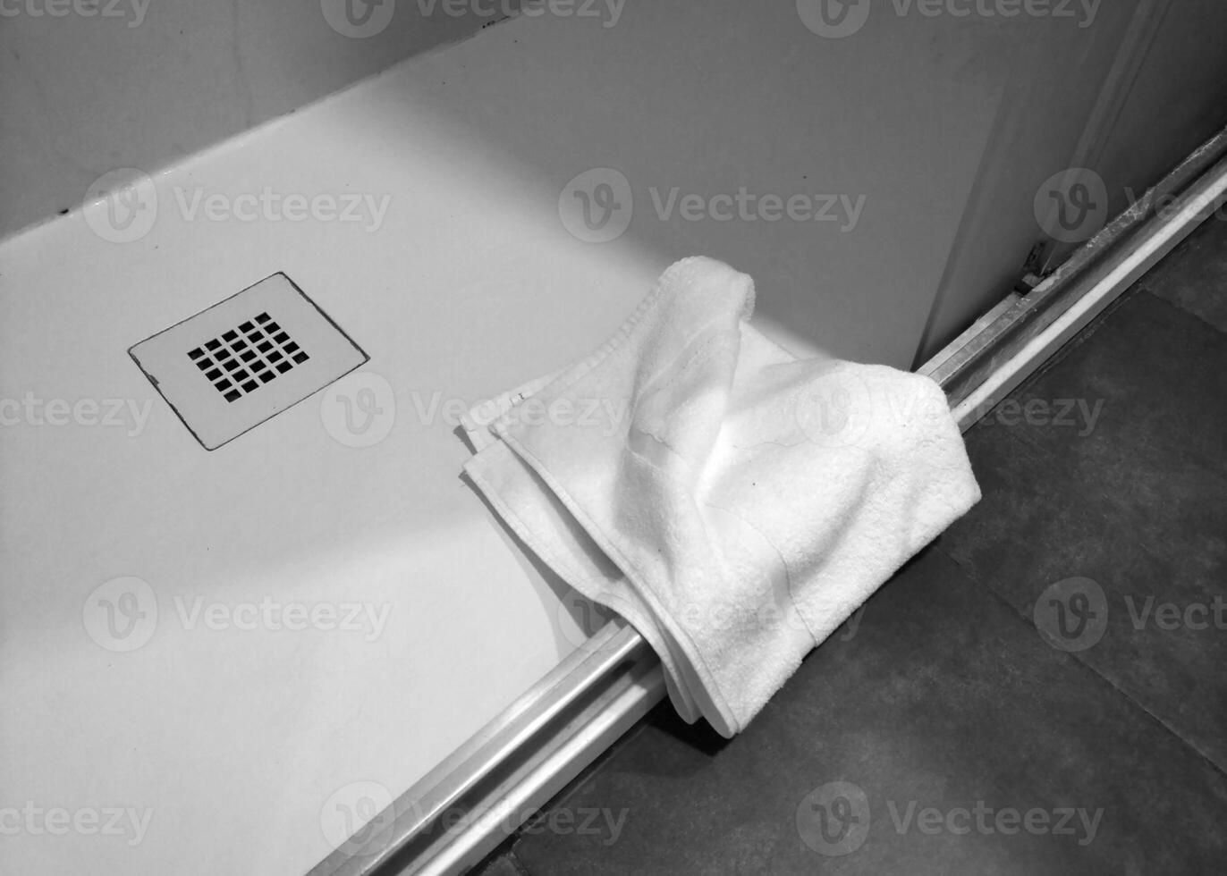 Clean Bathroom Aesthetic with White Towel and Modern Shower Design for Home Decor Inspiration photo