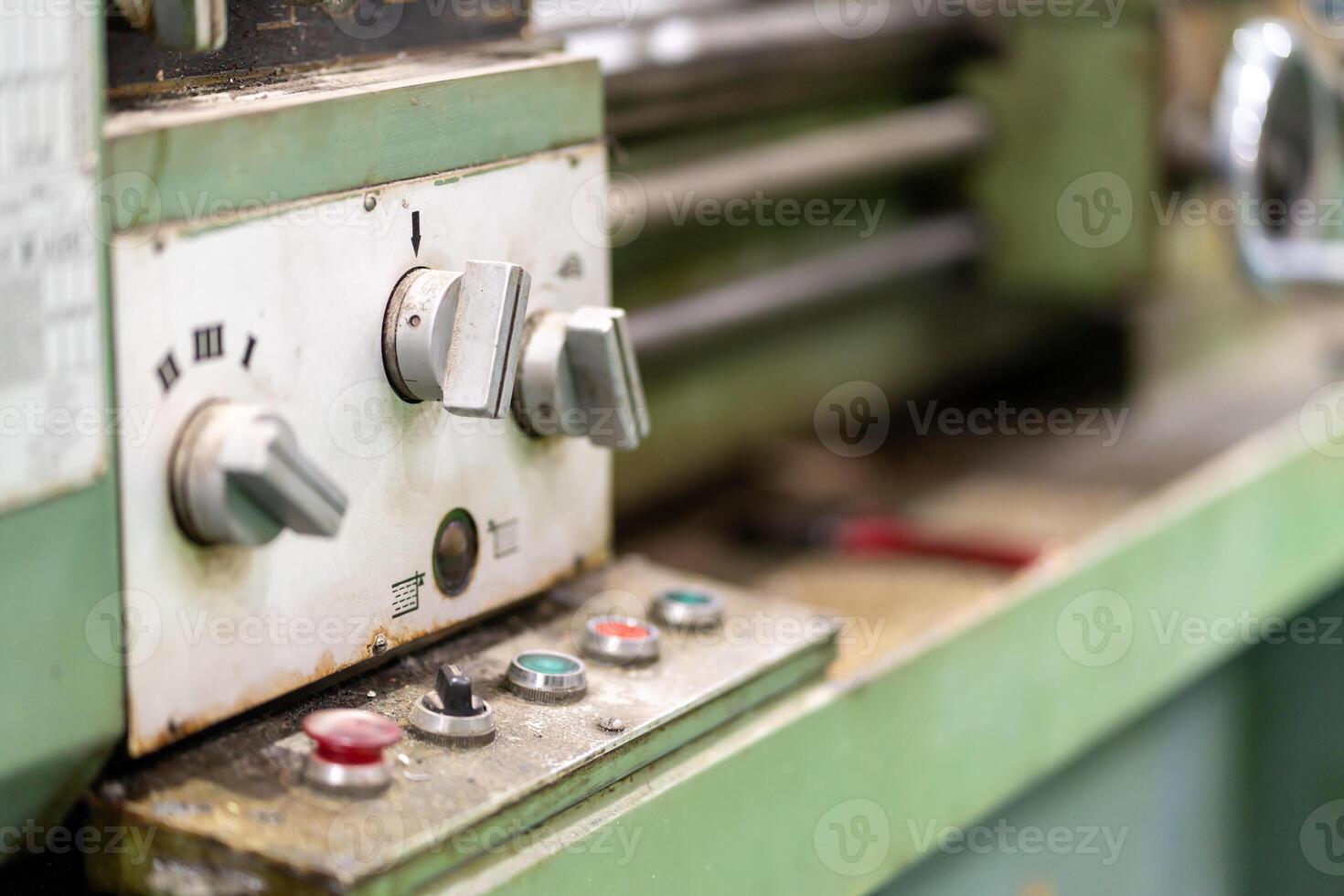 Closeup and crop old model lathe and drilling machine photo
